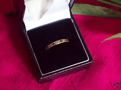 eternity ring ,diamonds and sapphires