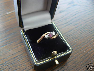 Gold 2 stone Diamond and Garnet Ring