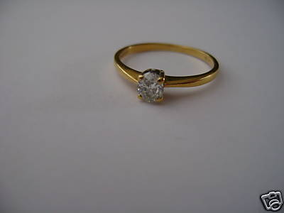 18CT GOLD DIAMOND SOLITAIRE SET RING